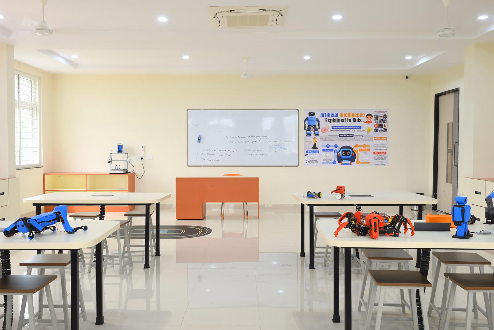 AI and Robotics Lab with educational robots displayed on white worktables